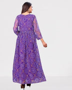 Anveri Graceful Woman Showcasing Elegant Purple Traditional Dress with Intricate Patterns**