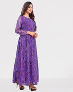 Anveri Graceful Woman Showcasing Elegant Purple Traditional Dress with Intricate Patterns**
